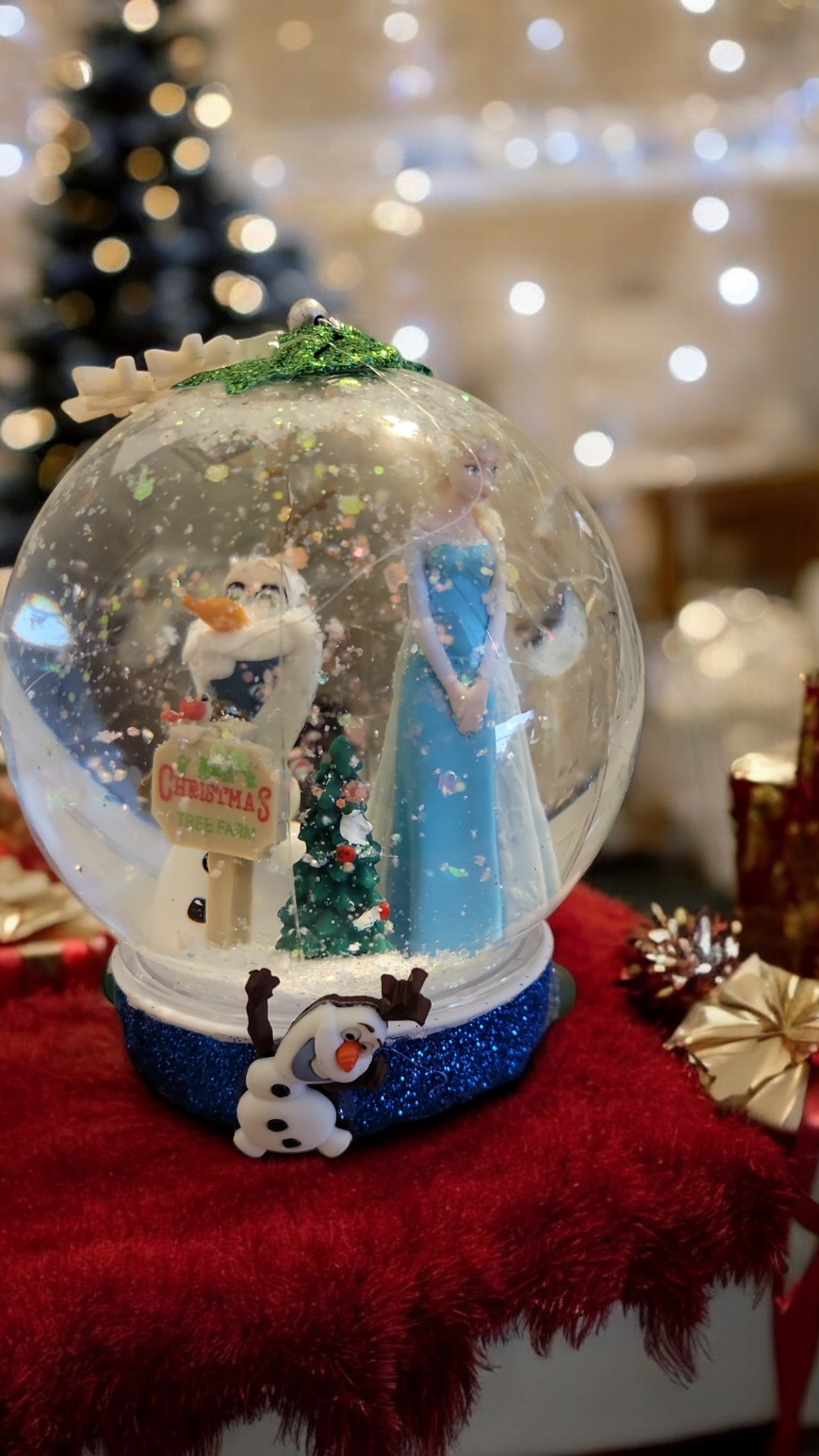 Frozen christmas snow globe